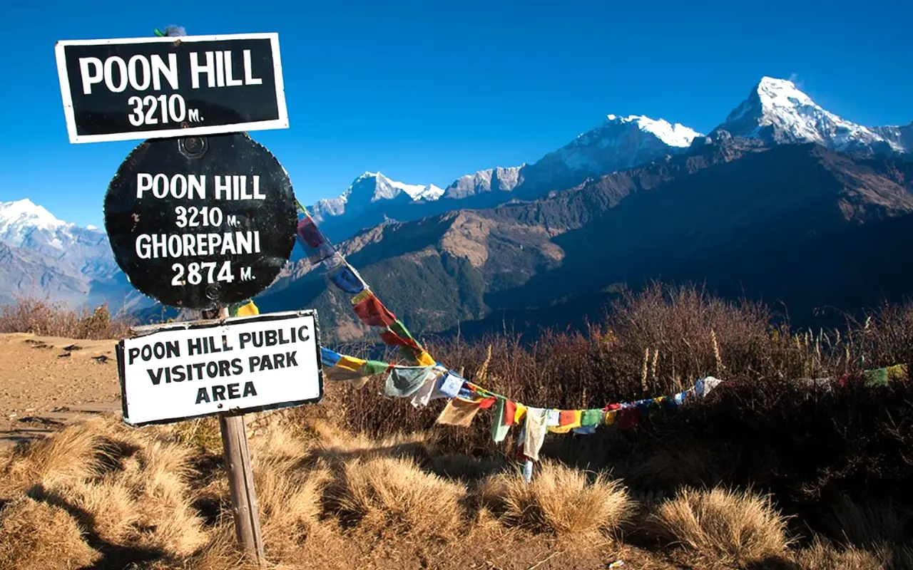A signboard at Poon Hill welcomes trekkers to the iconic sunrise viewpoint in the Annapurna region